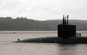 The Ohio-class ballistic missile submarine USS Louisiana sails into Naval Base Kitsap-Bangor in Washington state on April 5 following a strategic patrol. The high cost of purchasing a replacement fleet of strategic submarines will mean there is less funding available for buying other ships, a U.S. admiral said on Tuesday (U.S. Navy photo).