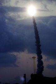 A modified Minuteman intercontinental ballistic missile leaves a vapor trail in March 2002 shortly after it was test-launched from Vandenberg Air Force Base, Calif. Two nuclear-weapon analysts are asserting that current $1 trillion plans to modernize the U.S. nuclear arsenal are unaffordable.