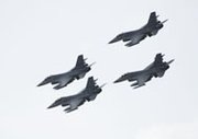 F-16 fighters fly over the Netherlands in June. The U.S. Congress in an omnibus spending bill unveiled this week cut funds to assess equipping a replacement aircraft, the F-35 Joint Strike Fighter, with the B-61 nuclear bomb.