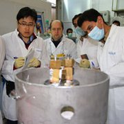 International Atomic Energy Agency inspectors and Iranian technicians on Monday disconnect links between twin centrifuge cascades for 20 percent uranium enrichment at Iran's Natanz facility. Iran would need to take substantial additional actions in any longer-term nuclear deal with world powers, according to a new analysis.