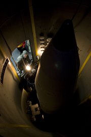 Then-Missile Defense Agency Director Lt. Gen. Patrick O'Reilly examines a missile-interceptor deployed at Fort Greely, Alaska, in 2010. A new congressional audit finds that the Pentagon is not providing sufficient information to allow a proper progress assessment of a key homeland antimissile system.