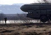 A Russian soldier guards a mock ballistic missile during a 2010 training exercise near Moscow. Russia may be deploying a cruise missile tied to its alleged breach of a Cold War-era nuclear treaty, a U.S. expert said on Wednesday.