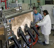 Personnel handle sensitive substances at the Y-12 National Security Complex in Tennessee, in this undated photo. The National Nuclear Security Administration confirmed on Wednesday that it had decided to go with an alternative plan for updating uranium-processing operations at the complex.