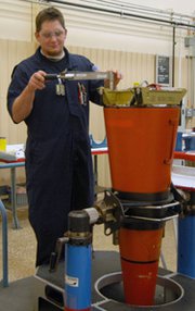 A technician performs maintenance on a U.S. W-76 nuclear warhead. House appropriators have moved to increase funding for U.S. nuclear warhead updates, even amid congressional efforts to seek less costly alternatives to these projects (U.S. National Nuclear Security Administration photo).