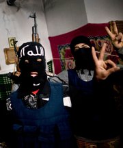 Syrian rebels, shown gathering on Thursday. The United States and Jordan are developing a joint plan for potentially securing Syria's chemical and possible biological warfare stocks amid continued violence in the country (AP Photo/Rodrigo Abd).