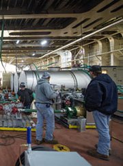 Contractors perform maintenance in January on chemical-destruction equipment onboard the U.S. vessel MV Cape Ray. NATO will not enlist Russian help to guard the vessel as it neutralizes warfare chemicals removed from Syria, the secretary general of the alliance said on Wednesday.