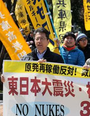 Japanese anti-nuclear demonstrators in Kobe hold a protest against government plans to resume atomic-energy production, as the country marks the third anniversary of the reactor meltdown at Fukushima. Some Japanese politicians reportedly want to see the country's nuclear reactors restarted and producing plutonium again because of the deterrence signal they feel it would send.