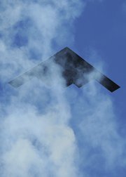 A U.S. B-2 strategic bomber, shown in January. Building an unmanned version of a future bomber aircraft could be unaffordable, the head of Air Force Global Strike Command signaled on Thursday (AP Photo/Mark Terrill).