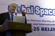 Center for Strategic and International Studies President John Hamre, shown in 2008 at a space summit in Beijing. A former deputy Defense secretary, Hamre recently led an effort to ask President Obama to take a case-by-case approach to nuclear trade and nonproliferation (AP Photo/Ng Han Guan).