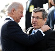 Senator Mark Kirk, right, greeted by Vice President Joe Biden upon his return to the Senate in January. The Illinois Republican is offering an amendment to defense legislation that could effectively block integration of Chinese-built interceptor components into NATO's missile shield (Jewel Samad/AFP/Getty Images).