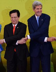 Vietnamese Prime Minister Nguyen Tan Dung and U.S. Secretary of State John Kerry on Wednesday pose for a photo during the 23rd summit of the Association of Southeast Asian Nations in Bandar Seri Begawan, Brunei. The two nations on Thursday signed a nuclear trade pact (ROSLAN RAHMAN/AFP/Getty Images).