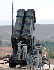 U.S. soldiers work on a Patriot missile system at a Turkish military base in Gaziantep in February. A group of Republican lawmakers has harshly criticized Ankara's plans to negotiate a contract to purchase a missile-defense system from a Chinese company, which they say would undermine U.S. and NATO security (Bulent Kilic/AFP/Getty Images).
