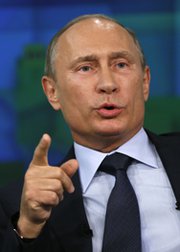 Russian President Vladimir Putin speaks during a June visit to the Russia Today studio in Moscow. Putin recently rescinded two government orders that focused on fostering missile defense cooperation with NATO (Yuri Kochetkov/AFP/Getty Images).