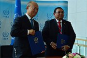 International Atomic Energy Agency Director General Yukiya Amano, left, and Myanmar Foreign Affairs Union Minister H.E. U Wunna Maung Lwin shown Tuesday in Vienna during a signing ceremony for a safeguards agreement that grants U.N. inspectors more access to nuclear sites in Myanmar (International Atomic Energy Agency photo).