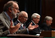 (Jul. 16) -JASON Defense Advisory Group Chairman Roy Schwitters, left, testifies before the Senate Armed Services Committee yesterday with the heads of the Los Alamos, Lawrence Livermore and Sandia national laboratories. The laboratory directors said an Obama administration plan would provide for adequate maintenance of the U.S. nuclear deterrent (Win McNamee/Getty Images)