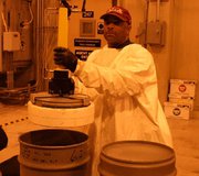 (Sep. 19) -The last M23 VX land mine at the Anniston Army Depot in Alabama is removed from a storage drum for destruction in 2008. The Anniston facility is due this week to complete the elimination of its chemical warfare stocks, which once included more than 660,000 shells and containers filled with lethal nerve and blister agents (U.S. Army Chemical Materials Agency photo).
