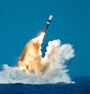 A U.S. Ohio-class submarine launches a Trident D-5 missile. The Obama administration might reconsider a plan to replace one Trident D-5 nuclear warhead, the W-88, with an interoperable warhead that could also be used on ground-based missiles, congressional aides and other observers say (Getty Images).